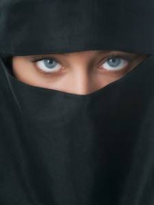 Beautiful blue eyed woman in traditional niqab veil