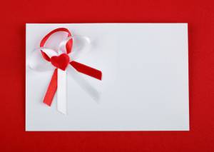 Wedding Traditions in the form of a Red and White envelope invitation 
