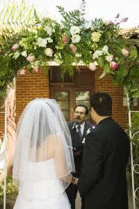 A couple on the podium for their wedding 